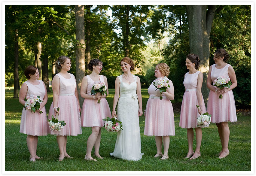bridal party in pink wedding dresses from lansing wedding photographers