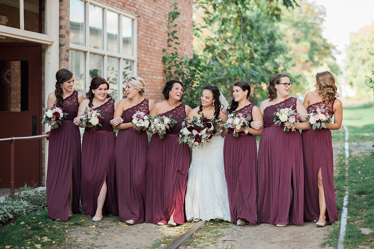 Bridal party photos in Old Town Lansing by Old Town Marquee