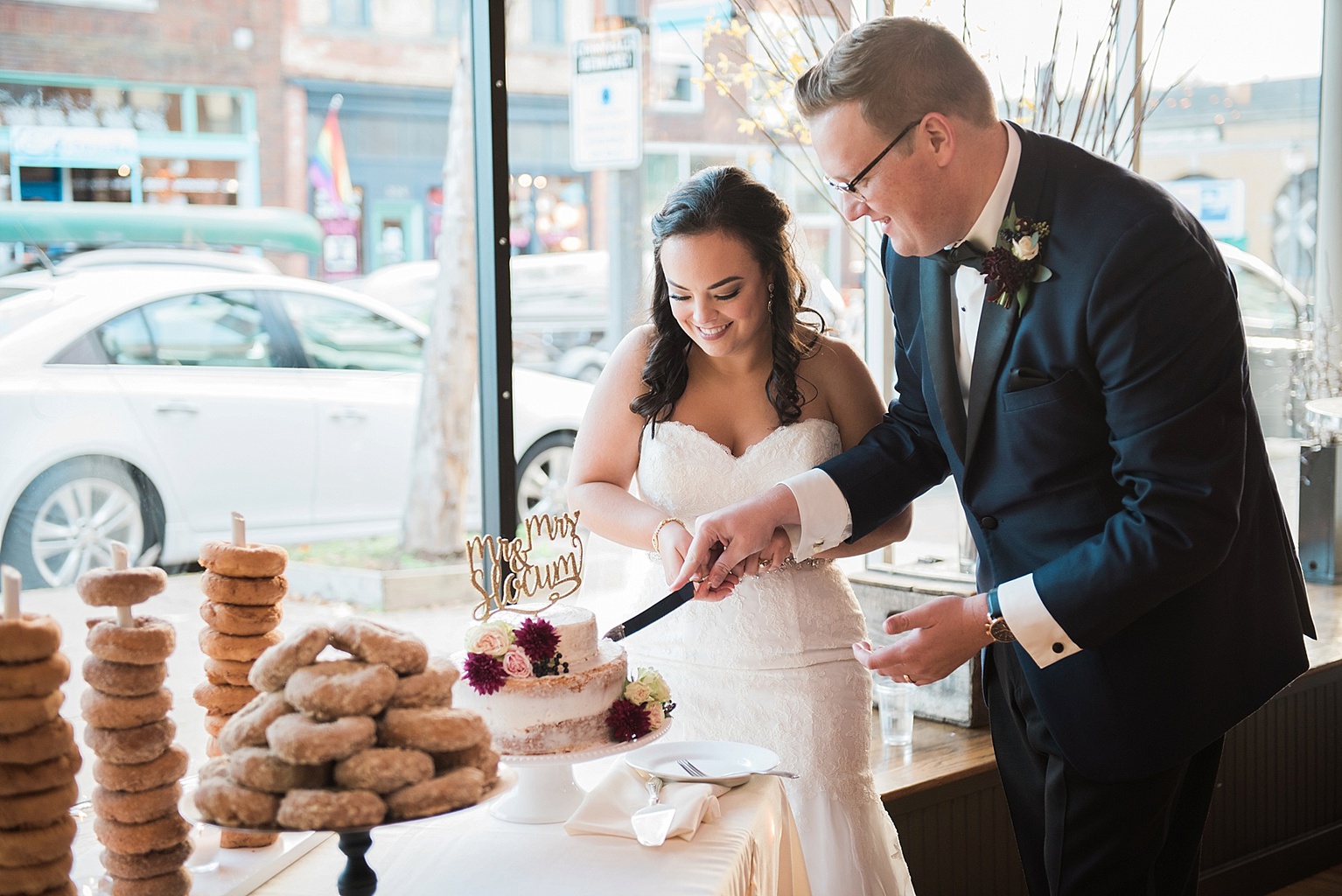 Lansing wedding venues: Old Town Marquee wedding reception photos (cake cutting)