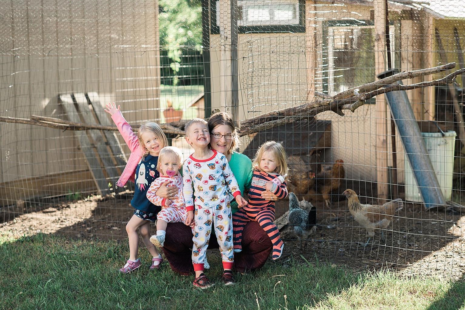 group photo near a chicken coop in the Saugatuck, Michigan area