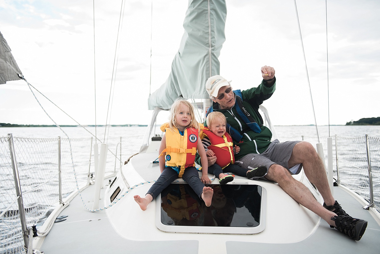 kids sailing on a Catalina 30 on the deck