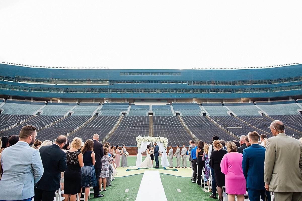 Big House wedding photos at UofM (wedding on the field)
