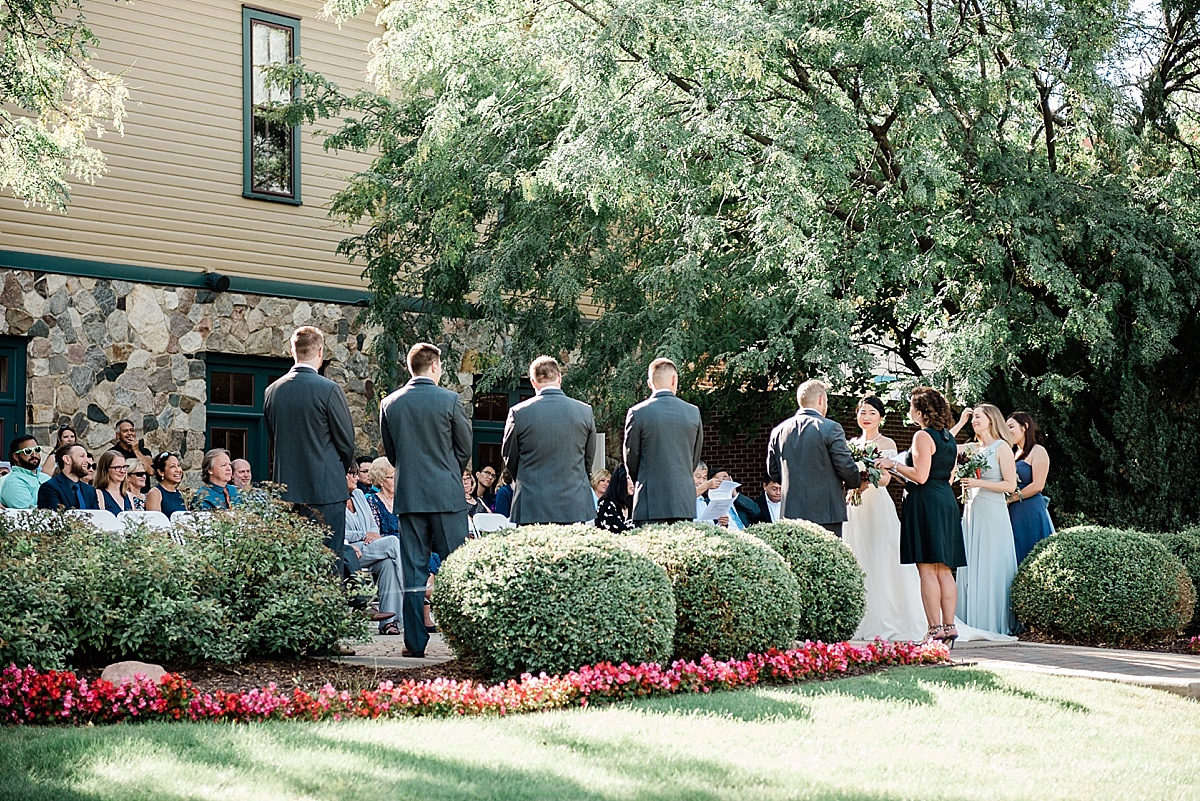 Grand Ledge Opera House wedding photos; ceremony on the back patio
