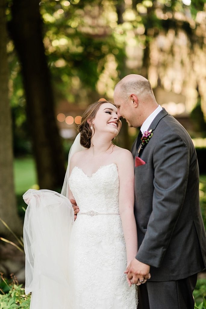 bride and groom photos in the gardens at The English Inn, by Allie & Co. Lansing wedding photography