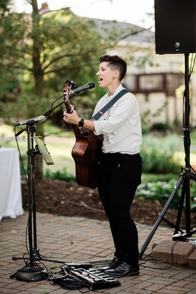 Music on the back patio by Karley Davidson during cocktail hour at The English Inn, by Allie & Co. Lansing wedding photography