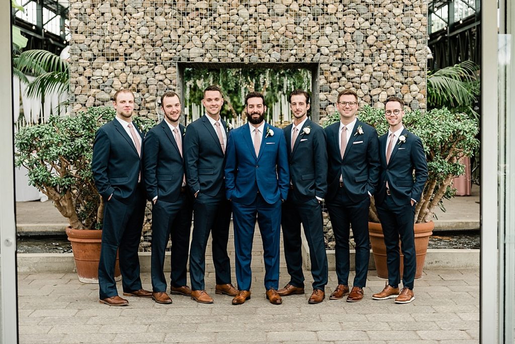 groomsmen photos in the entrance of Planterra Conservatory, Wedding Photos in West Bloomfield, Michigan, by Allie & Co. wedding photographers