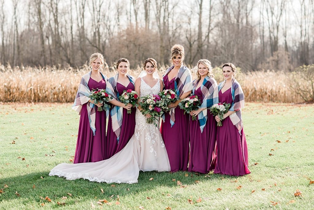A photo of the bridesmaids at Stone House Farm, a Michigan barn wedding venue