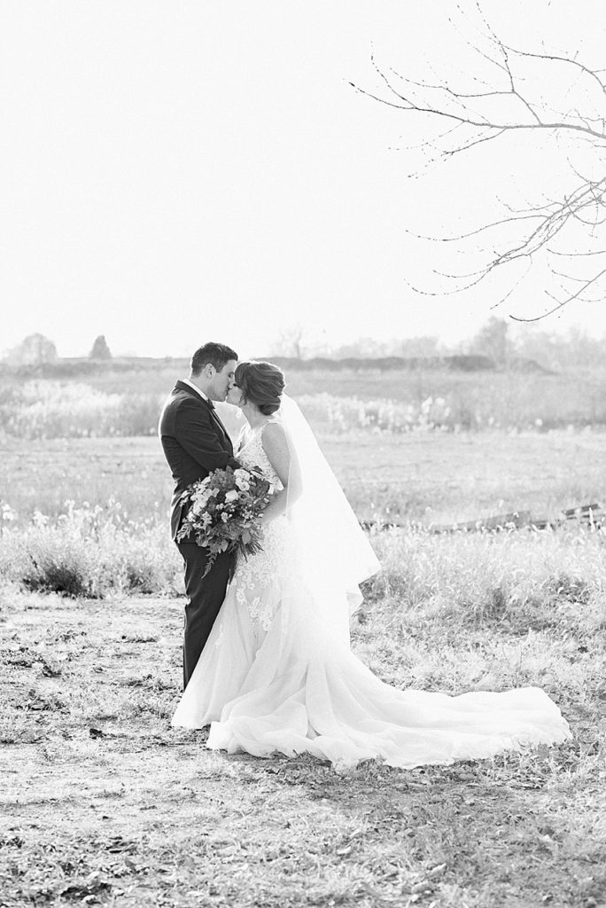 Late fall bride and groom portraits at Stone House Farm, a Michigan barn wedding venue, by Allie & Co. Photography, Michigan wedding photographers