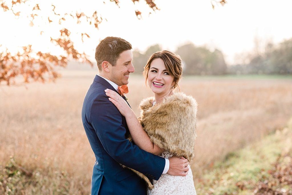 Late fall bride and groom portraits at Stone House Farm, a Michigan barn wedding venue, by Allie & Co. Photography, Michigan wedding photographers