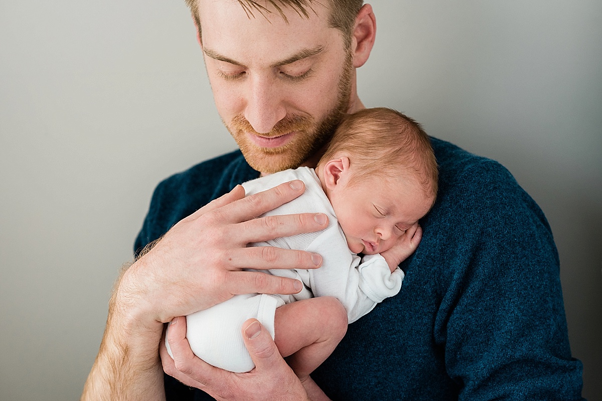 Lifestyle newborn photography at home in Lansing, Michigan