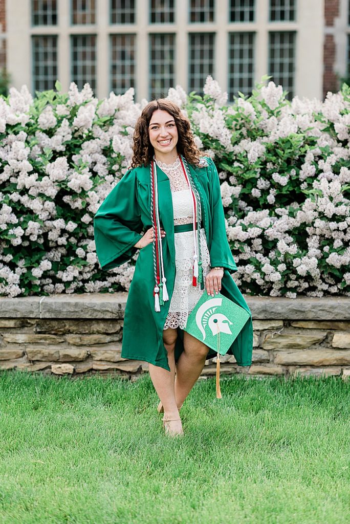 Michigan State University (MSU) senior photo in a white dress in front of Spring flowers East Lansing, Michigan - by Allie Siarto Photography, Michigan photographers