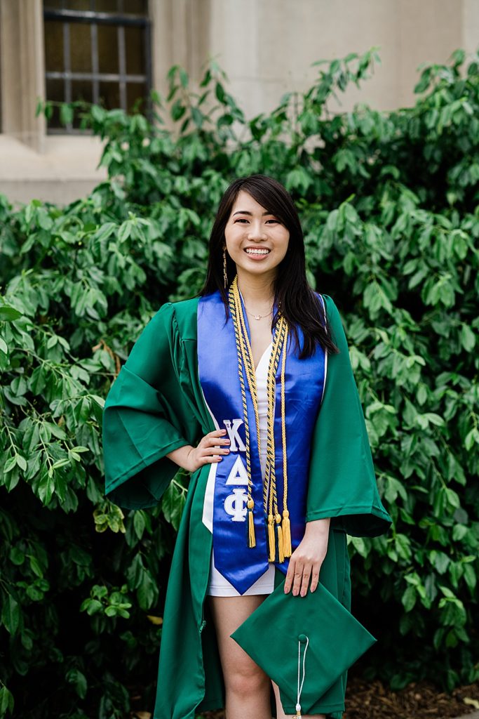 Michigan State Senior Graduation Pictures in cap and gown on campus; grad photos in front of the side of Beaumont Tower by Allie Siarto & Co. Photography