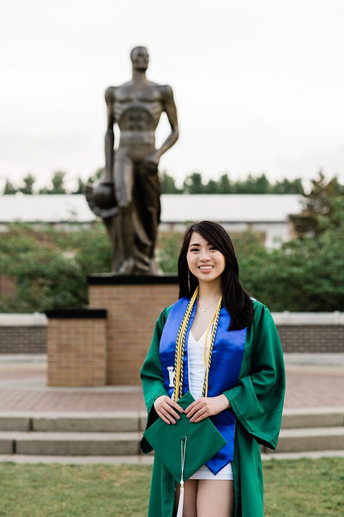 Michigan State Senior Graduation Pictures in cap and gown on campus; grad photos in front of the Sparty Statue by Allie Siarto & Co. Photography