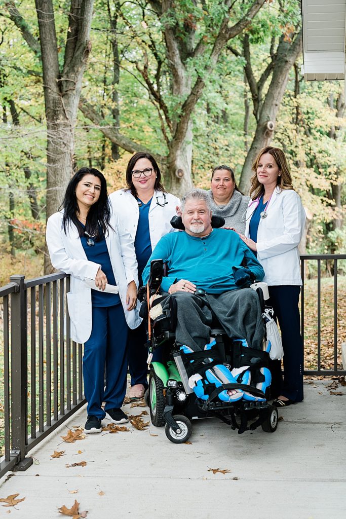 Branding photos with four nurses and their patient by Allie & Co. Commercial Photography in Lansing, Michigan