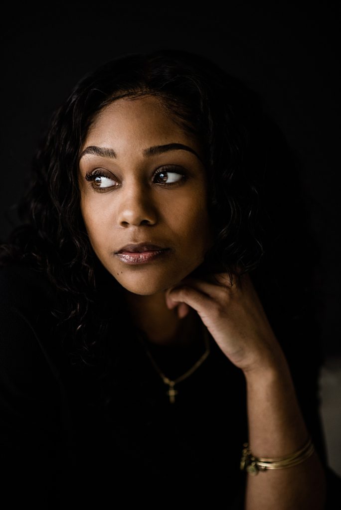 Lansing coommercial photographer, Allie Siarto Photography, shares a portrait of a woman on a black background