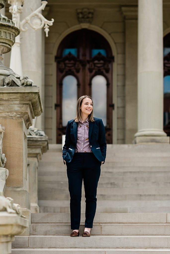Lansing head shot photographer, photo of a woman standing on the steps of Michigan's Capital Building, by Allie Siarto & Co. Photography, Michigan branding photographers