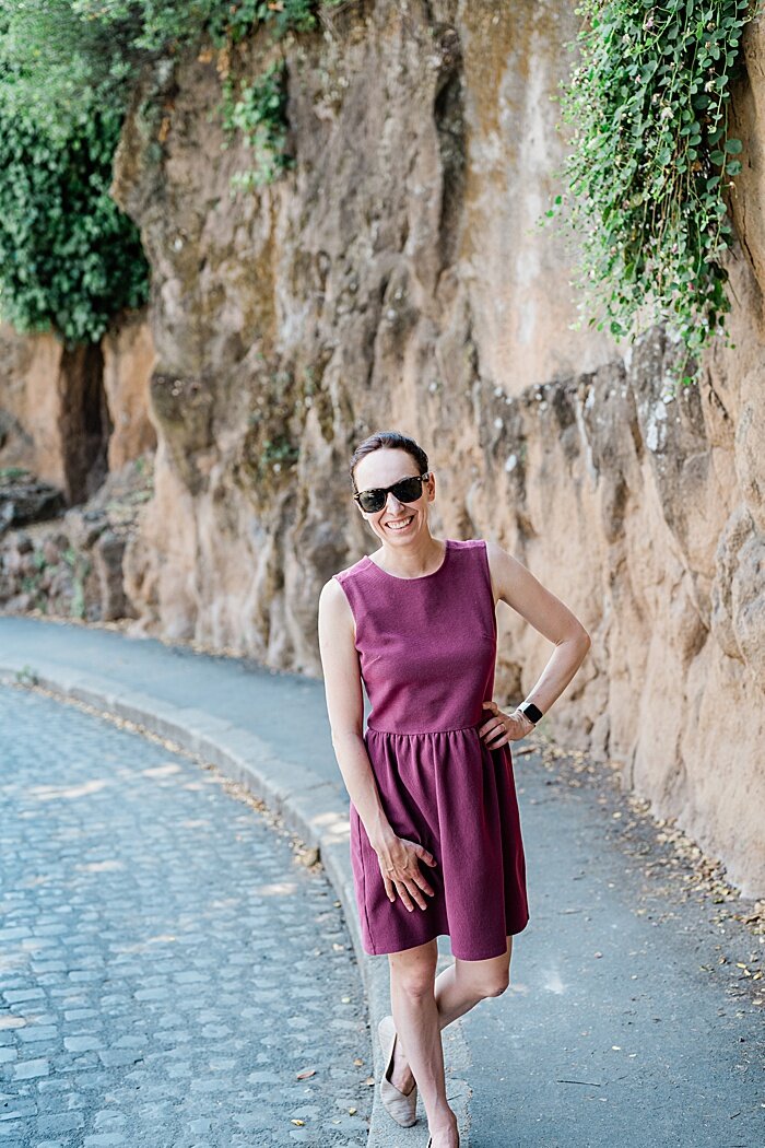 Michigan branding photographer in Rome - Allie Siarto by a rock wall in Rome