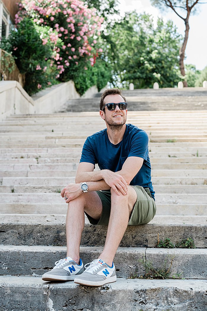 Michigan branding photographer in Rome - Jeff sitting on steps in Trastevere