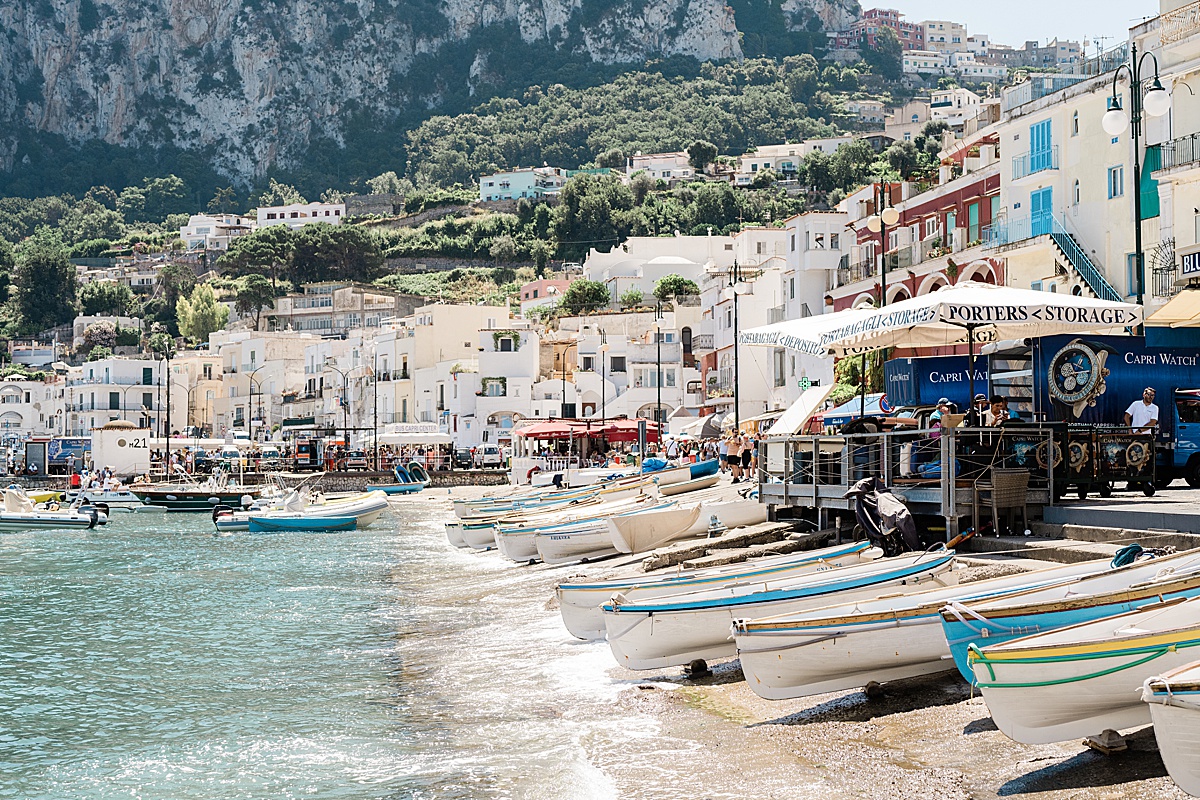Michigan branding photographer in Rome - the view of the beachfront n Capri with canoes and colorful buildings