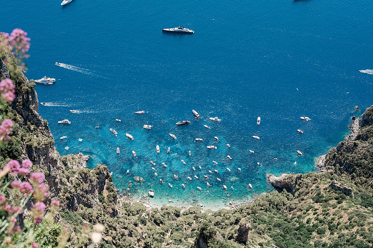 Michigan branding photographer in Rome - the view looking down at the boats and water from the top of Capri