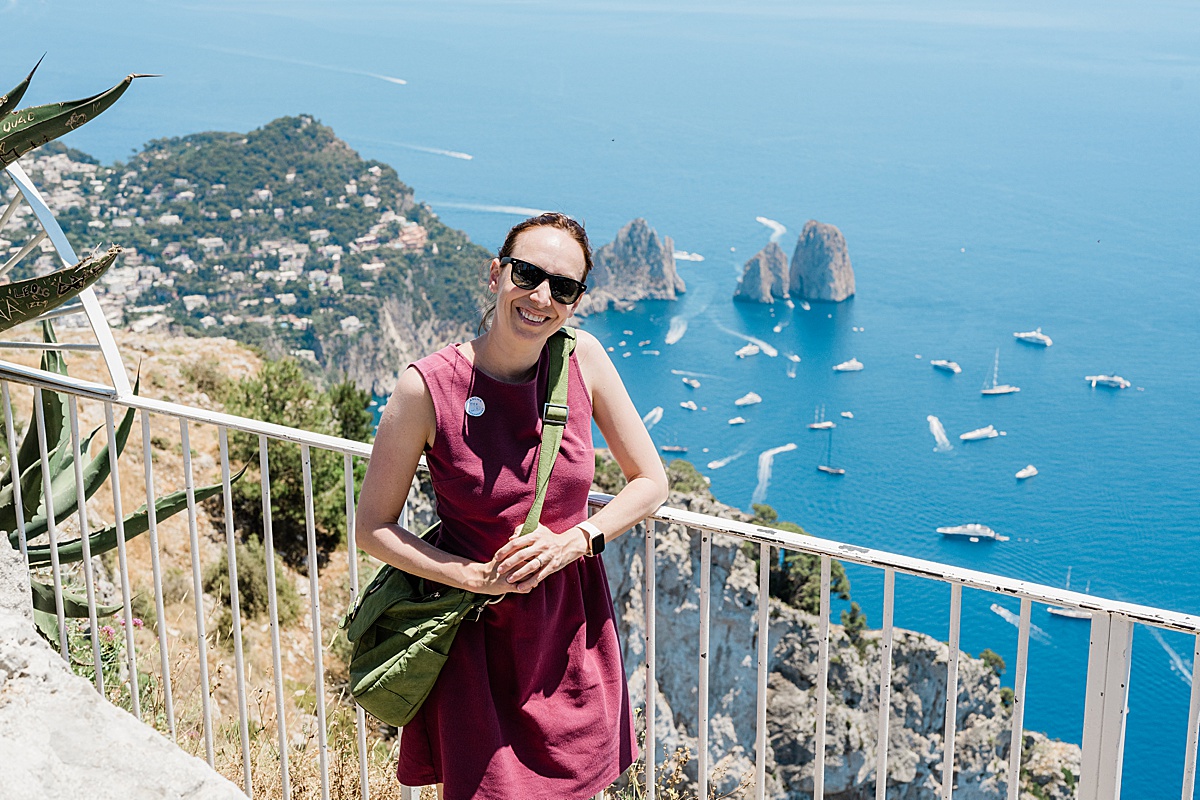Michigan branding photographer in Rome - the view looking down at the boats and water from the top of Capri