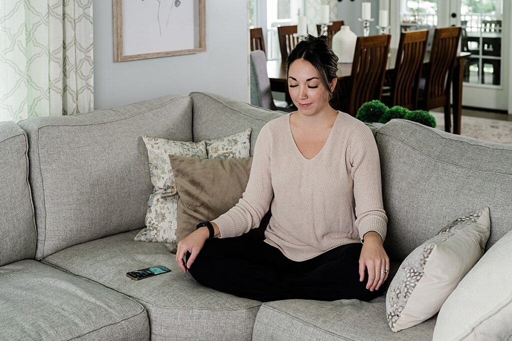 Product photography of a woman using the meditation feature of an Ease Band. Photo by Allie Siarto, Lansing, Michigan product photographer.